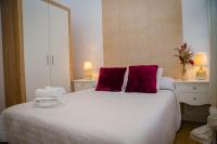 Posteľ alebo postele v izbe v ubytovaní Hostal Restaurante Benalup Golf