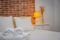 Posteľ alebo postele v izbe v ubytovaní Hostal Restaurante Benalup Golf