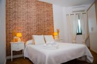 Posteľ alebo postele v izbe v ubytovaní Hostal Restaurante Benalup Golf