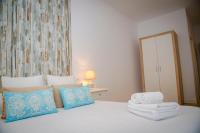 Posteľ alebo postele v izbe v ubytovaní Hostal Restaurante Benalup Golf
