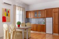 A kitchen or kitchenette at Seaview Stylish Flat in Andros - walk to beach