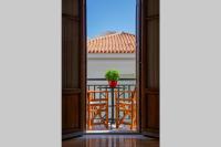 A balcony or terrace at Seaview Stylish Flat in Andros - walk to beach