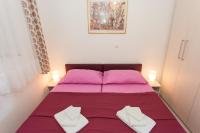 Posteľ alebo postele v izbe v ubytovaní Apartments Palma Ragusa