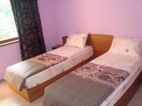 Postel nebo postele na pokoji v ubytování Villa Mari Guest Rooms