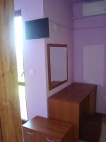 TV a/nebo společenská místnost v ubytování Villa Mari Guest Rooms