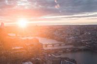 an aerial view of a city with a river and a bridge at citizenM Southwark Bankside in London