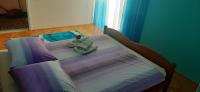 Posteľ alebo postele v izbe v ubytovaní Apartment Vana