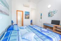 Posteľ alebo postele v izbe v ubytovaní Apartments Ivanović