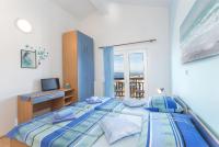 Posteľ alebo postele v izbe v ubytovaní Apartments Ivanović