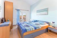Posteľ alebo postele v izbe v ubytovaní Apartments Ivanović