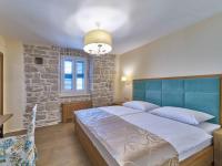 Postel nebo postele na pokoji v ubytování Villa Mladenka by Interhome