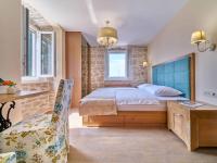 Postel nebo postele na pokoji v ubytování Villa Mladenka by Interhome