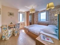 Postel nebo postele na pokoji v ubytování Villa Mladenka by Interhome
