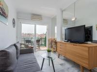 Televízia a/alebo spoločenská miestnosť v ubytovaní Apartment Port Ducal-3 by Interhome