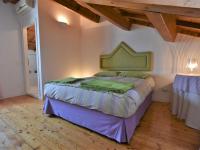 A bed or beds in a room at Apartment Loft Este by Interhome