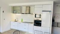 Kuchyň nebo kuchyňský kout v ubytování DELUX apartament Salou