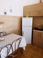 A kitchen or kitchenette at Villa Stella Family House