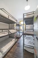 Łóżko lub łóżka w pokoju w obiekcie Hostel Orange