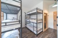 Łóżko lub łóżka w pokoju w obiekcie Hostel Orange