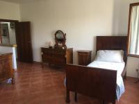 A bed or beds in a room at VILLA CLANI apartment