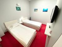 Posteľ alebo postele v izbe v ubytovaní Hostel Promenada