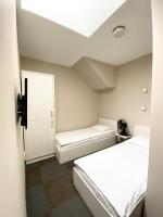 Posteľ alebo postele v izbe v ubytovaní Hostel Promenada