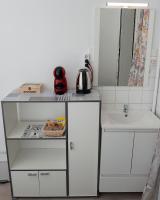 A kitchen or kitchenette at Hostal Santa Cruz