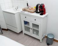 A kitchen or kitchenette at Hostal Santa Cruz