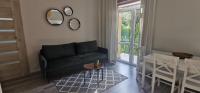 Posedenie v ubytovaní Apartament "Nad dachami"