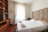 Posteľ alebo postele v izbe v ubytovaní De Angeli Cozy Apartment- Youhosty