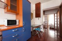Kuchyňa alebo kuchynka v ubytovaní De Angeli Cozy Apartment- Youhosty