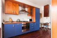 Kuchyňa alebo kuchynka v ubytovaní De Angeli Cozy Apartment- Youhosty