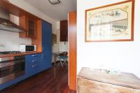 Kuchyňa alebo kuchynka v ubytovaní De Angeli Cozy Apartment- Youhosty