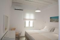 Posteľ alebo postele v izbe v ubytovaní Nireas Apartments Mykonos Downtown
