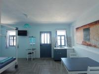 Posteľ alebo postele v izbe v ubytovaní Anemos Guest House Karpathos