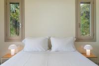 A bed or beds in a room at Ionian Garden Villas - Villa Sol