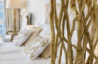 Posteľ alebo postele v izbe v ubytovaní Gallery Luxury Suites & Rooms-Only Adults