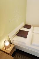 Posteľ alebo postele v izbe v ubytovaní Zadar Street Apartments and Room
