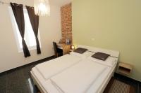 Posteľ alebo postele v izbe v ubytovaní Zadar Street Apartments and Room