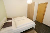 Posteľ alebo postele v izbe v ubytovaní Zadar Street Apartments and Room