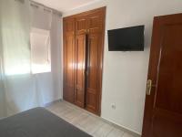 Televízia a/alebo spoločenská miestnosť v ubytovaní MI CASA