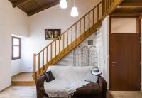 Postel nebo postele na pokoji v ubytování Asikiko Suites