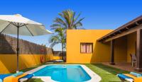 Bazén v ubytování Villa Oasis II nebo v jeho okolí