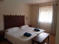 Postel nebo postele na pokoji v ubytování Villa Oasis II