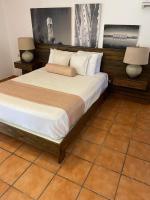 Postel nebo postele na pokoji v ubytování El Morro Eco Adventure Hotel