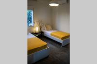 A bed or beds in a room at Istron Avra