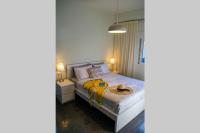 A bed or beds in a room at Istron Avra