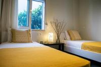 A bed or beds in a room at Istron Avra