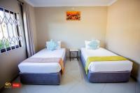 Douglas Lodge & Apartmentsにあるベッド
