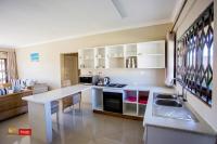 Douglas Lodge & Apartmentsにあるキッチンまたは簡易キッチン